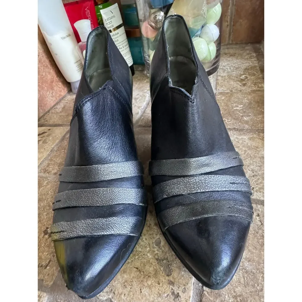 Black and silver low heel leather booties